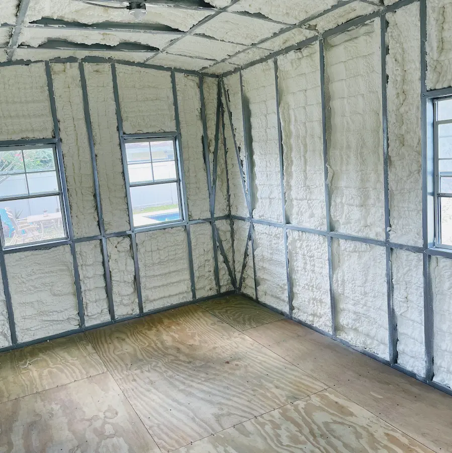 Closed-cell spray foam insulation applied to wall cavities in a residential project in Doney Park